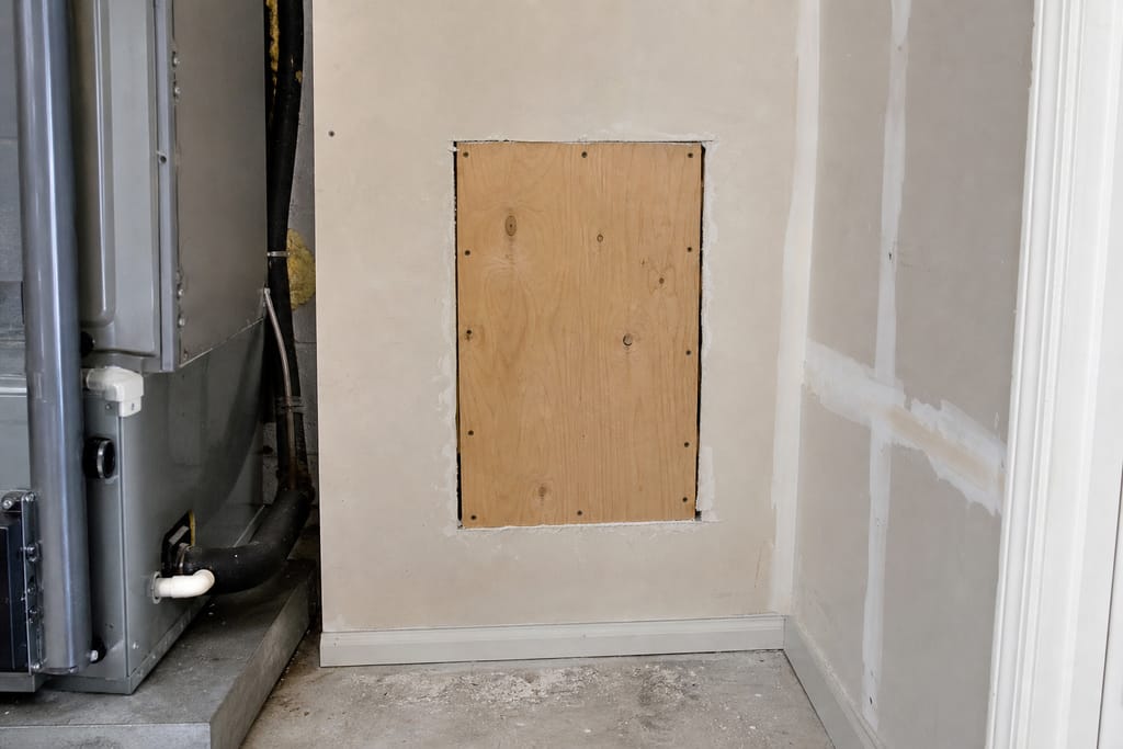 Removing damaged drywall photo
